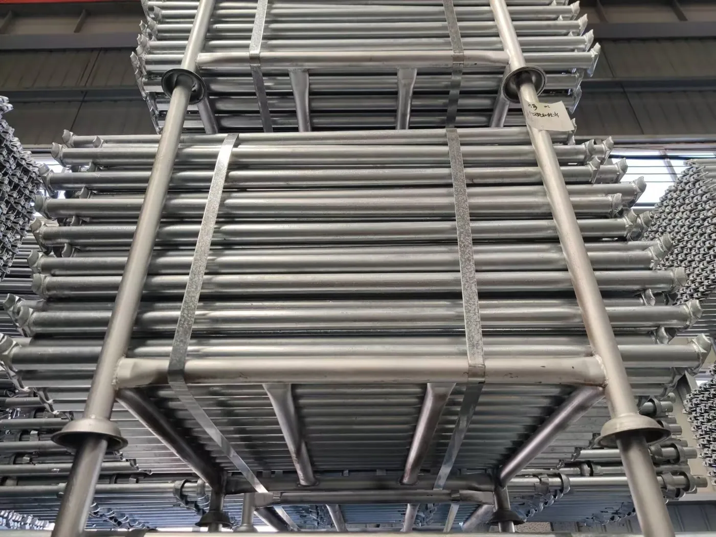 Cup joints and welded ledger ends before galvanising